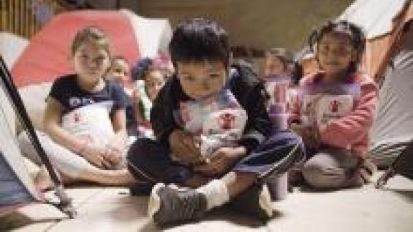 Image of children who received care kits from Save The Children in Mexico.